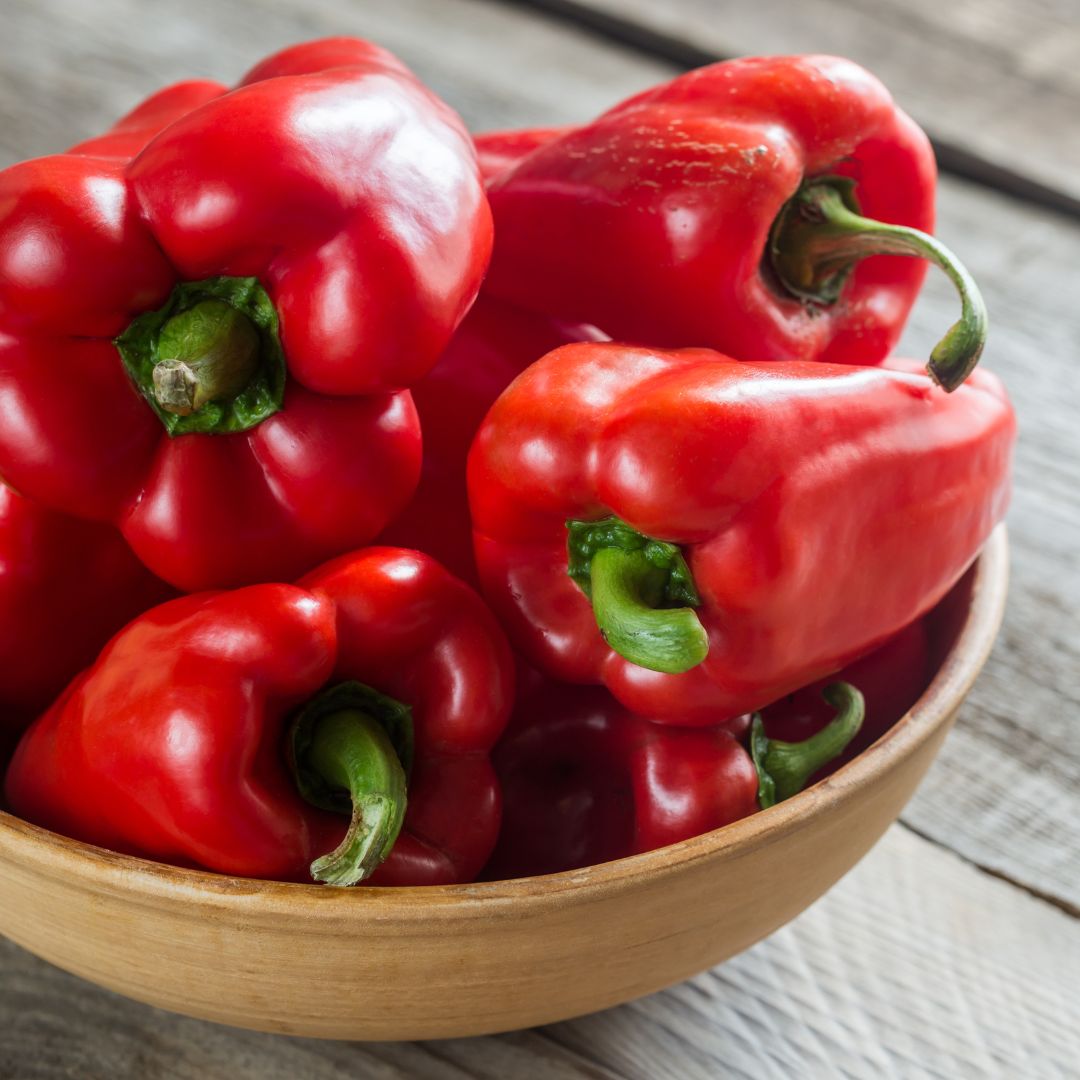 A bowl of red bell peppers